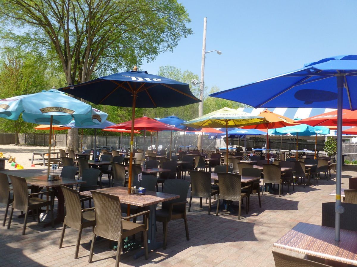 Captain's Table patio dining area set for a private event